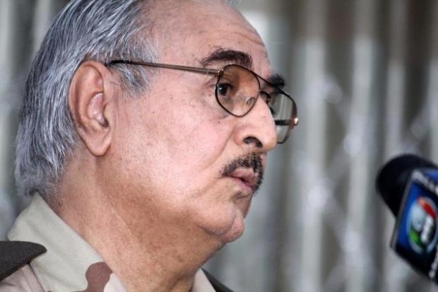 Retired Libyan Army general Khalifa Haftar speaks during a press conference in the town of Abyar, May 17, 2014 