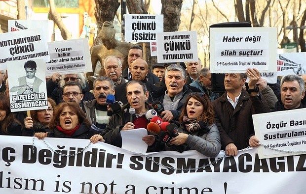 A demonstration in Ankara, in support of Dündar and Gül. One banner reads: ‘Journalism is not a crime!’ Photograph: Adem Altan/AFP/Getty Images