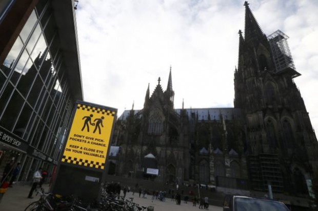 A sign outside Cologne's central station warns about pickpockets