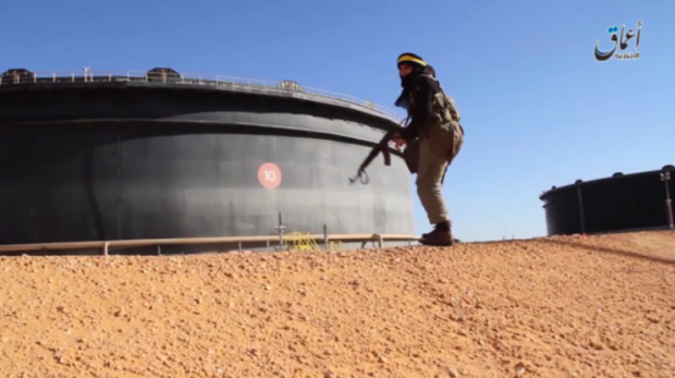 An ISIS fighter near an oil facility in Sirte, Libya. PHOTO: ISLAMIC STATE GROUP MEDIA CENTER