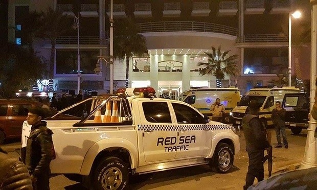 Egyptian security personnel outside the entrance to the Bella Vista hotel in the Red Sea resort of Hurghada, Egypt. Photograph: EPA