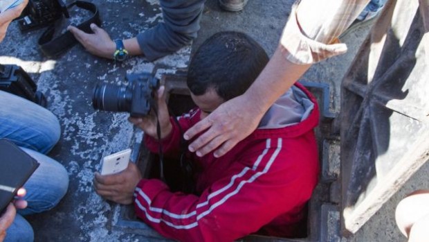 On Saturday journalists went to see the manhole through which Guzman tried to escape during the operation on Friday