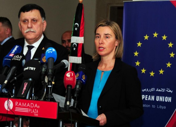 Libyan prime minister Fayez Sarraj, left, and European Union foreign policy chief Federica Mogherini participate in a media conference in Tunis, Tunisia, Friday, Jan. 8, 2016. European Union foreign policy chief Federica Mogherini has announced a 100-million euro aid ($109 million) for Libyas UN.-supported unity government, one day after the attack that killed at least 60 policemen in the Libyan town of Zliten. Mogherini condemned the attack, in a joint press conference with Libyan prime minister Fayez Sarraj Friday in Tunis.  (AP Phhoto/Hassene Dridi)