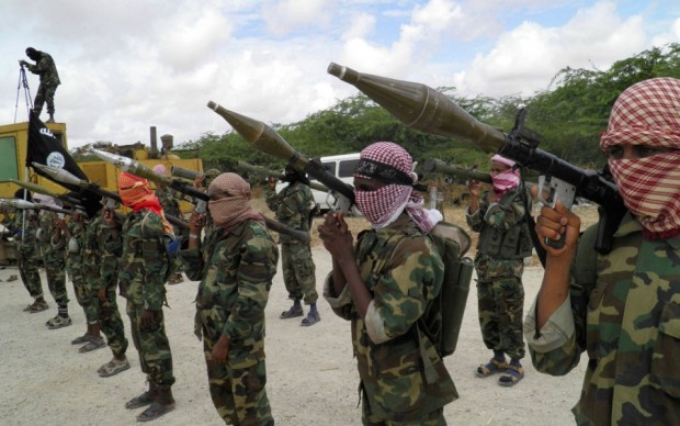 Al-Shabaab fighters display weapons as they conduct military exercises in Mogadishu, Somalia on Oct. 21, 2010.Mohamed Sheikh Nor/AP