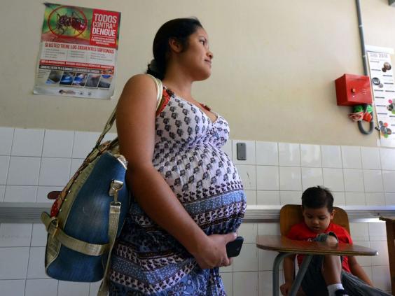 A pregnant woman waits to be attended at the Maternal and Children's Hospital in Tegucigalpa. The medical school at the National Autonomous University of Honduras (UNAH) recommended that women in the country avoid getting pregnant for the time being due to the presence of the Zika virus. If a pregnant woman is infected by the virus, the baby could be born with microcephaly.