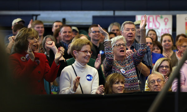 A crowd cheered for Hillary Clinton at a campaign event on Tuesday at Nashua Community College in New Hampshire. Credit Richard Perry/The New York Times