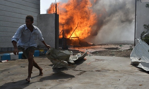 The aftermath of an airstrike in Al Hudaydah, Yemen, which Ban Ki-moon said was ‘in flames’ from bombing. Photograph: Abduljabbar Zeyad/Reuters