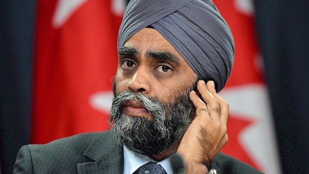 Defence Minister Harjit Sajjan helps announce Canada's plan to resettle 25,000 Syrian refugees during a press conference at the National Press Theatre in Ottawa on Tuesday, Nov. 24, 2015. Sajjan is uniquely qualified to know how Ottawa's abstract policy decisions can be bent, twisted and mangled in the far-flung corners of the globe ??? sometimes to the detriment of those in uniform.THE CANADIAN PRESS/Fred Chartrand (Fred Chartrand/Canadian Press)