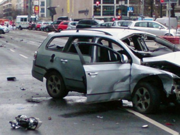  Berlin Police uploaded a picture of the wreckage of a silver VW Passat with its windows blown out and its front end smashed in Berlin Police/Twitter 