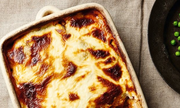 Yotam Ottolenghi’s merguez and potato bake. Photograph: Louise Hagger for the Guardian. Food styling: Emily Kydd. Prop styling: Jennifer Kay