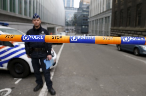 A Belgian police officer stands guard near the federal police headquarters in Brussels, March 19, 2016, after Salah Abdeslam, the most-wanted fugitive from November's Paris attacks, was arrested after a shootout with police in Brussels on Friday. (Francois Lenoir/Reuters)