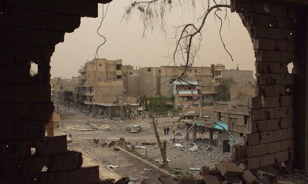 Mohammad Bashir al-Aani and his son were seized by Isis in their home town of Deir ez-Zor, pictured in 2013. Photograph: Reuters