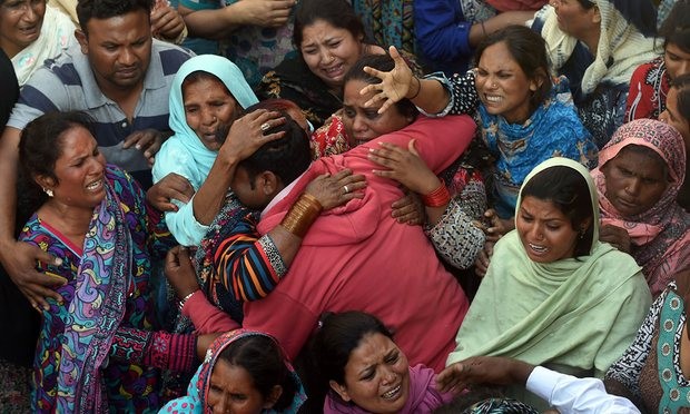 Pakistani Christians mourn at a funeral for a victim of the Easter Sunday suicide bombing in Lahore. Photograph: Arif Ali/AFP/Getty Images