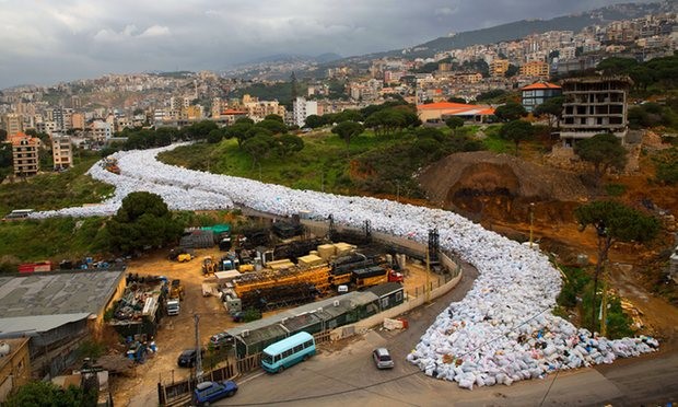 Packed rubbish bags fill a street in Jdeideh, east Beirut. Residents have joked that it resembles one of Lebanon’s ski slopes. Photograph: Hassan Ammar/AP