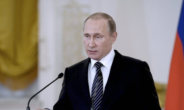  Vladimir Putin delivers a speech during a ceremony at the Kremlin for soldiers returning from Syria. Photograph: Reuters 