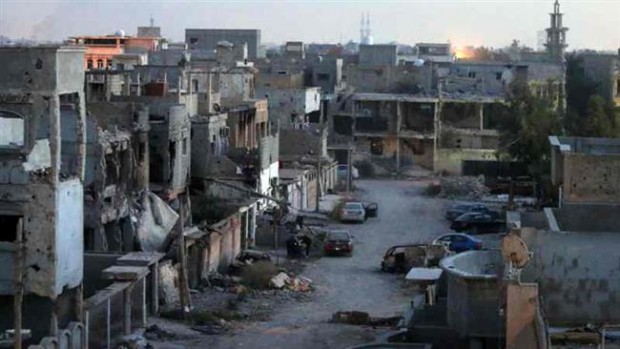 The picture, taken on February 27, 2016, shows damaged buildings after forces loyal to Libya’s internationally-recognized government retook the center of the coastal city of Benghazi following fierce fighting with militant groups. (Photo by AFP)