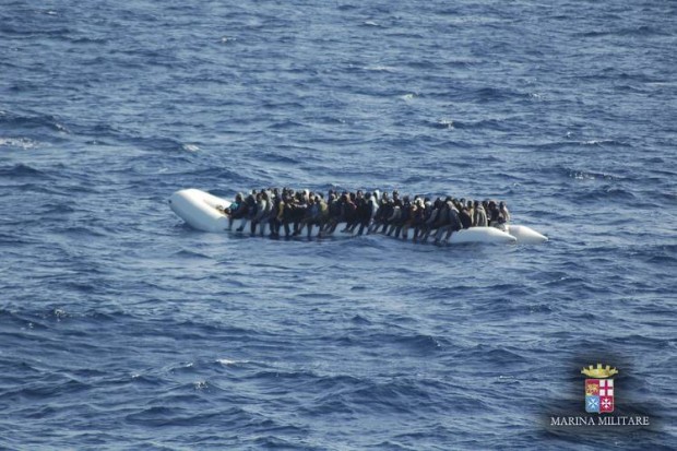 Migrants in a dinghy off the coast of Lampedusa island, Italy, photographed on Wednesday. Some EU leaders are discussing naval operations in the Mediterranean amid the continuing crisis in Libya, on the sidelines of a summit in Brussels on Friday. PHOTO: ASSOCIATED PRESS