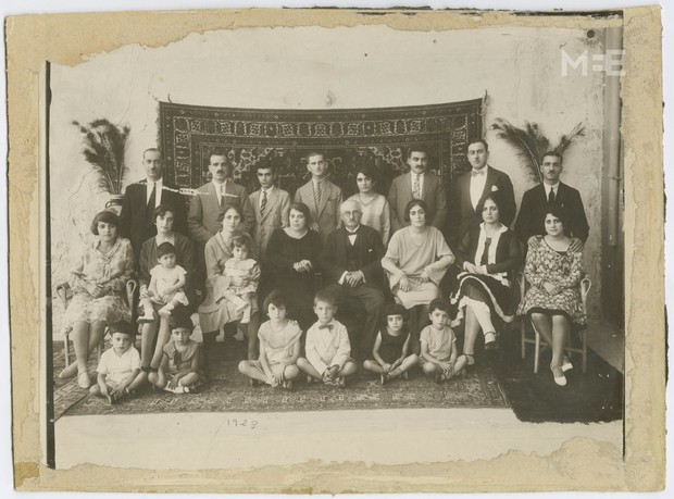  The annual photo of Spridon Sarouf family. Jaffa, 1928. From the family album of Abla & Alfred Tubasi (The Palestinian Museum) 
