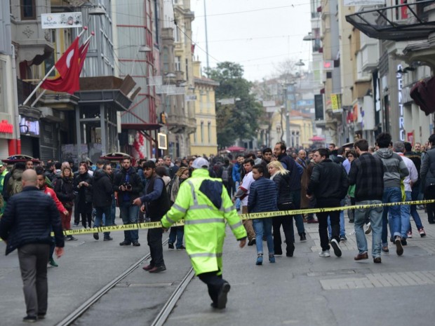 Turkish police push people away after an explosion on the pedestrian Istiklal avenue in Istanbul on March 19, 2016. AFP/Getty Images