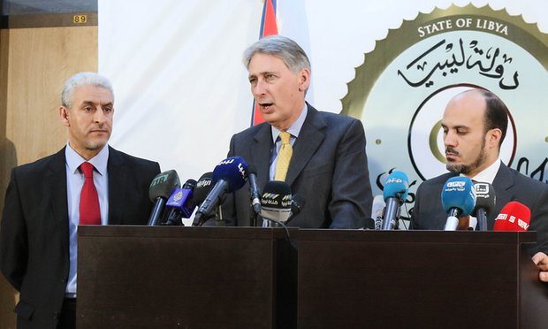 Philip Hammond, centre, discussing the threat from Isis alongside Libyan government ministers in Tripoli. Photograph: Xinhua/Barcroft Media