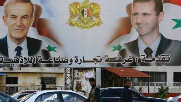 Syria's Alawites are closely associated with Bashar al-Assad (R) and his late father Hafez (L)