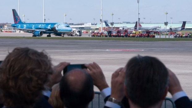 People watched as the first flight out of the reopened airport left for Faro