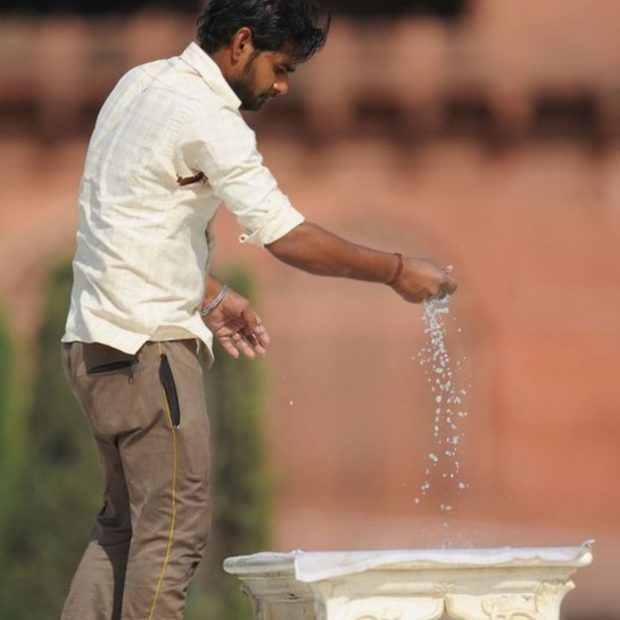 The bench was cooled with water before it was graced by the Cambridges