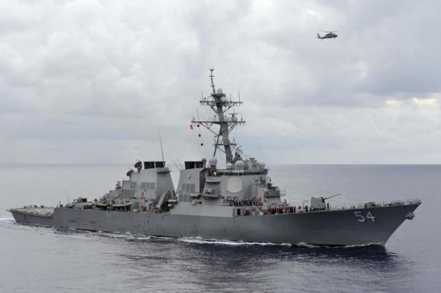 The U.S. Navy guided-missile destroyer USS Curtis Wilbur patrols in the Philippine Sea in this August 15, 2013 file photo.