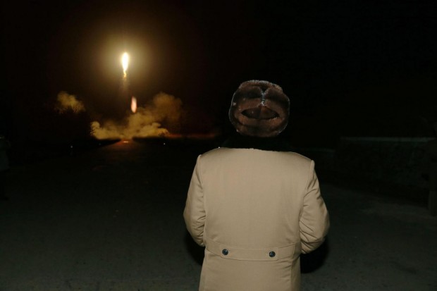 North Korean leader Kim Jong-un, watching a ballistic missile launch drill in an undisclosed location EPA