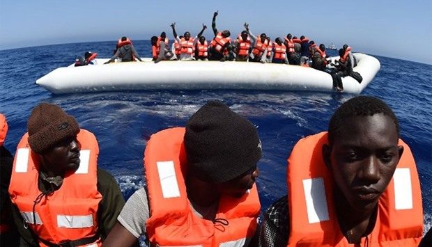 Coastguard and navy boats had took part in 26 different operations which rescued a total of 3,324 migrants on June 26, 2016. AFP