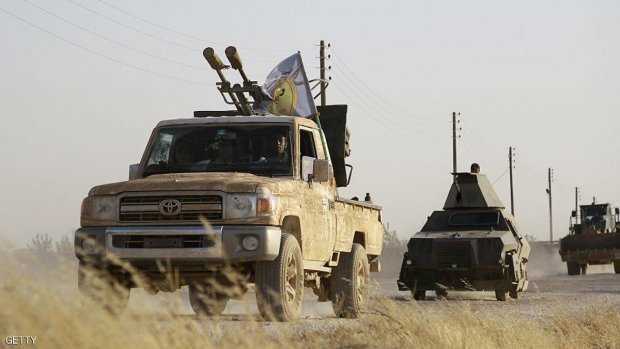 US-backed Kurdish and Arab fighters advance into the Islamic State (IS) jihadist's group bastion of Manbij, in northern Syria, on June 23, 2016.  Backed by air strikes by the US-led coalition bombing IS in Syria and Iraq, fighters with the Syrian Democratic Forces (SDF) alliance entered Manbij from the south, a monitoring group said.  / AFP / DELIL SOULEIMAN        (Photo credit should read DELIL SOULEIMAN/AFP/Getty Images)