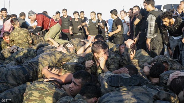 Soliders involved in the coup attempt surrender on Bosphorus bridge on July 16, 2016 in Instabul,  Turkey. Istanbul's bridges across the Bosphorus, the strait separating the European and Asian sides of the city, have been closed to traffic. Turkish President Recep Tayyip Erdogan has denounced an army coup attempt, that has left atleast 90 dead 1154 injured in overnight clashes in Istanbul and Ankara. (Photo by Gokhan Tan/Getty Images)