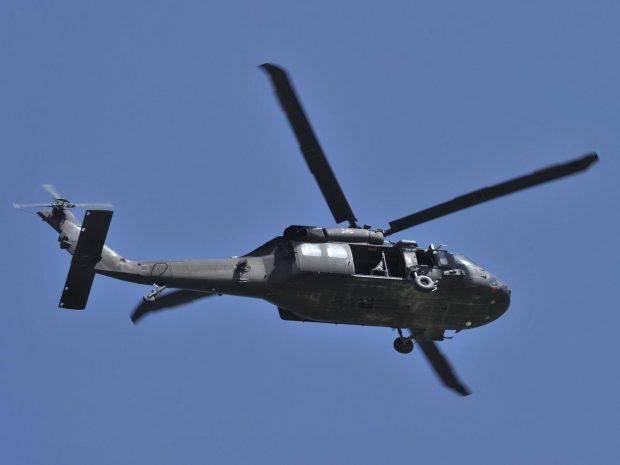 Seven military personnel and one civilian landed in northern Greece in a Blackhawk helicopter AFP/Getty