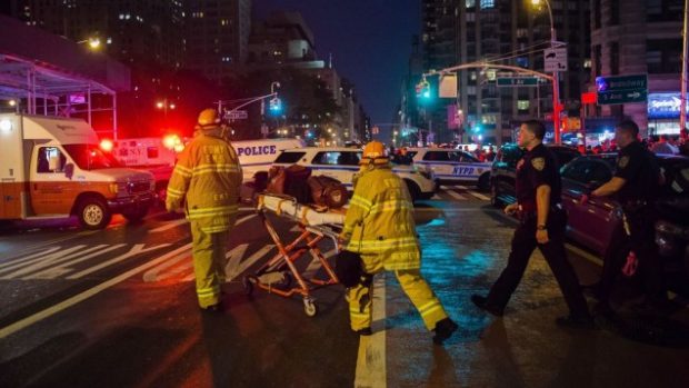 Police and firefighters work near the scene of an explosion in Manhattan's Chelsea neighborhood, in New York, September 17, 2016. (AP/Andres Kudacki)