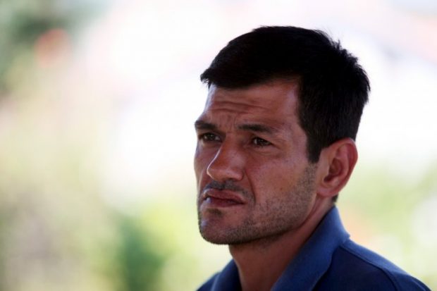 Abdullah Kurdi, father of three-year old Alan Kurdi, waits at a morgue in Mugla, Turkey in this file photo - Reuters