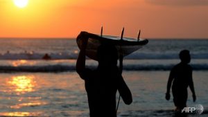 A pocket of Hinduism in Muslim-majority Indonesia, Bali attracts millions of foreign visitors every year due to its palm-fringed, tropical beaches and picture-postcard temples. AFP/Sonny Tumbelaka     Enlarge 