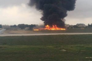 An image taken from a video of the crashed plane at Malta’s international airport on Monday. Photo: Associated P