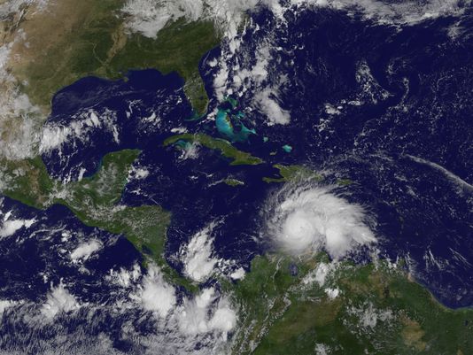 A satellite image from Friday, Sept. 30, 2016, shows Hurricane Matthew spinning in the Caribbean. It's now a Category 3 major hurricane. (Photo: NASA)