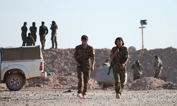 Members of the Syrian Democratic Forces (SDF) north of Raqqa in Syria. Photograph: Rodi Said/Reuters